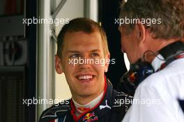 03.04.2009 Kuala Lumpur, Malaysia,  Sebastian Vettel (GER), Red Bull Racing and Helmut Marko (AUT), Red Bull Racing, Red Bull Advisor  - Formula 1 World Championship, Rd 2, Malaysian Grand Prix, Friday Practice
