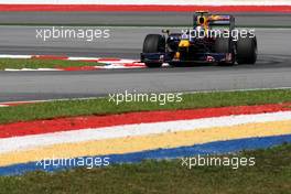 03.04.2009 Kuala Lumpur, Malaysia,  Sebastian Vettel (GER), Red Bull Racing, RB5 - Formula 1 World Championship, Rd 2, Malaysian Grand Prix, Friday Practice