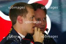 03.04.2009 Kuala Lumpur, Malaysia,  Sebastian Vettel (GER), Red Bull Racing and Christian Horner (GBR), Red Bull Racing, Sporting Director  - Formula 1 World Championship, Rd 2, Malaysian Grand Prix, Friday Practice