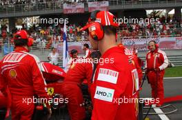 05.04.2009 Kuala Lumpur, Malaysia,  Michael Schumacher (GER), Test Driver, Scuderia Ferrari - Formula 1 World Championship, Rd 2, Malaysian Grand Prix, Sunday Pre-Race Grid