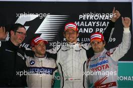 05.04.2009 Kuala Lumpur, Malaysia,  Nick Heidfeld (GER), BMW Sauber F1 Team, Jenson Button (GBR), Brawn GP and Timo Glock (GER), Toyota F1 Team  - Formula 1 World Championship, Rd 2, Malaysian Grand Prix, Sunday Podium