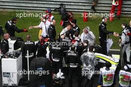 05.04.2009 Kuala Lumpur, Malaysia,  Jenson Button (GBR), Brawn GP,  celebrates winning on the reformed grid, after te race is red flag due to rain - Formula 1 World Championship, Rd 2, Malaysian Grand Prix, Sunday Podium