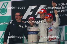 05.04.2009 Kuala Lumpur, Malaysia,  Nick Heidfeld (GER), BMW Sauber F1 Team, Jenson Button (GBR), Brawn GP and Timo Glock (GER), Toyota F1 Team - Formula 1 World Championship, Rd 2, Malaysian Grand Prix, Sunday Podium