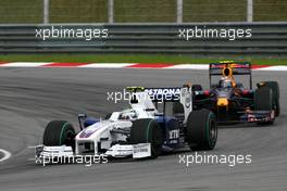 05.04.2009 Kuala Lumpur, Malaysia,  Nick Heidfeld (GER), BMW Sauber F1 Team and Sebastian Vettel (GER), Red Bull Racing  - Formula 1 World Championship, Rd 2, Malaysian Grand Prix, Sunday Race