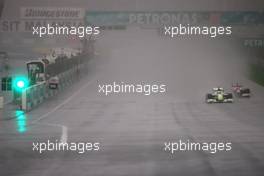 05.04.2009 Kuala Lumpur, Malaysia,  Jenson Button (GBR), Brawn GP and Timo Glock (GER), Toyota F1 Team  - Formula 1 World Championship, Rd 2, Malaysian Grand Prix, Sunday Race