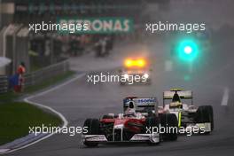 05.04.2009 Kuala Lumpur, Malaysia,  Jarno Trulli (ITA), Toyota F1 Team and Rubens Barrichello (BRA), Brawn GP  - Formula 1 World Championship, Rd 2, Malaysian Grand Prix, Sunday Race