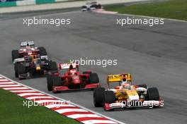 05.04.2009 Kuala Lumpur, Malaysia,  Fernando Alonso (ESP), Renault F1 Team, R29, leads Kimi Raikkonen (FIN), Räikkönen, Scuderia Ferrari, F60 - Formula 1 World Championship, Rd 2, Malaysian Grand Prix, Sunday Race