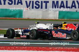 05.04.2009 Kuala Lumpur, Malaysia,  Nick Heidfeld (GER), BMW Sauber F1 Team and Sebastian Vettel (GER), Red Bull Racing - Formula 1 World Championship, Rd 2, Malaysian Grand Prix, Sunday Race