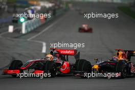 05.04.2009 Kuala Lumpur, Malaysia,  Lewis Hamilton (GBR), McLaren Mercedes and Mark Webber (AUS), Red Bull Racing  - Formula 1 World Championship, Rd 2, Malaysian Grand Prix, Sunday Race