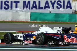 05.04.2009 Kuala Lumpur, Malaysia,  Nick Heidfeld (GER), BMW Sauber F1 Team and Sebastian Vettel (GER), Red Bull Racing - Formula 1 World Championship, Rd 2, Malaysian Grand Prix, Sunday Race