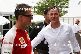 04.04.2009 Kuala Lumpur, Malaysia,  Michael Schumacher (GER), Scuderia Ferrari with his brother Ralf Schumacher (GER), DTM driver  - Formula 1 World Championship, Rd 2, Malaysian Grand Prix, Saturday