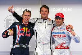 04.04.2009 Kuala Lumpur, Malaysia,  Sebastian Vettel (GER), Red Bull Racing, Jenson Button (GBR), Brawn GP and Jarno Trulli (ITA), Toyota F1 Team  - Formula 1 World Championship, Rd 2, Malaysian Grand Prix, Saturday Qualifying