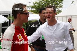 04.04.2009 Kuala Lumpur, Malaysia,  Michael Schumacher (GER), Scuderia Ferrari with his brother Ralf Schumacher (GER), DTM driver - Formula 1 World Championship, Rd 2, Malaysian Grand Prix, Saturday