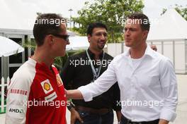 04.04.2009 Kuala Lumpur, Malaysia,  Michael Schumacher (GER), Scuderia Ferrari with his brother Ralf Schumacher (GER), DTM driver - Formula 1 World Championship, Rd 2, Malaysian Grand Prix, Saturday