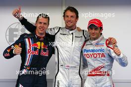 04.04.2009 Kuala Lumpur, Malaysia,  Sebastian Vettel (GER), Red Bull Racing, Jenson Button (GBR), Brawn GP and Jarno Trulli (ITA), Toyota F1 Team  - Formula 1 World Championship, Rd 2, Malaysian Grand Prix, Saturday Qualifying