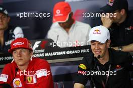 02.04.2009 Kuala Lumpur, Malaysia,  Kimi Raikkonen (FIN), Räikkönen, Scuderia Ferrari, Sebastian Vettel (GER), Red Bull Racing - Formula 1 World Championship, Rd 2, Malaysian Grand Prix, Thursday Press Conference