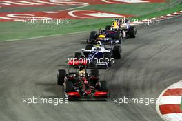 27.09.2009 Singapore, Singapore,  Lewis Hamilton (GBR), McLaren Mercedes leads Nico Rosberg (GER), WilliamsF1 Team and Sebastian Vettel (GER), Red Bull Racing - Formula 1 World Championship, Rd 14, Singapore Grand Prix, Sunday Race