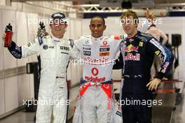 26.09.2009 Singapore, Singapore,  Nico Rosberg (GER), WilliamsF1 Team, Lewis Hamilton (GBR), McLaren Mercedes, Sebastian Vettel (GER), Red Bull Racing - Formula 1 World Championship, Rd 14, Singapore Grand Prix, Saturday Qualifying