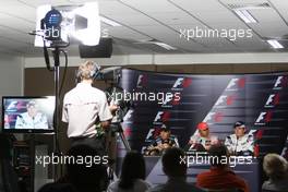 26.09.2009 Singapore, Singapore,  Sebastian Vettel (GER), Red Bull Racing, Lewis Hamilton (GBR), McLaren Mercedes, Nico Rosberg (GER), WilliamsF1 Team - Formula 1 World Championship, Rd 14, Singapore Grand Prix, Saturday Press Conference