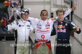 26.09.2009 Singapore, Singapore,  Nico Rosberg (GER), Williams F1 Team, Lewis Hamilton (GBR), McLaren Mercedes and Sebastian Vettel (GER), Red Bull Racing   - Formula 1 World Championship, Rd 14, Singapore Grand Prix, Saturday Qualifying