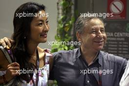26.09.2009 Singapore, Singapore,  Jean Todt (FRA) and Michelle Yeoh wife of Jean Todt - Formula 1 World Championship, Rd 14, Singapore Grand Prix, Saturday