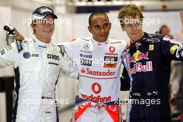 26.09.2009 Singapore, Singapore,  Nico Rosberg (GER), WilliamsF1 Team, Lewis Hamilton (GBR), McLaren Mercedes, Sebastian Vettel (GER), Red Bull Racing - Formula 1 World Championship, Rd 14, Singapore Grand Prix, Saturday Qualifying