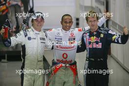 26.09.2009 Singapore, Singapore,  Nico Rosberg (GER), Williams F1 Team, Lewis Hamilton (GBR), McLaren Mercedes and Sebastian Vettel (GER), Red Bull Racing  - Formula 1 World Championship, Rd 14, Singapore Grand Prix, Saturday Qualifying