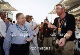 01.11.2009 Abu Dhabi, United Arab Emirates,  Jean Todt (FIA) and Boris Becker - Formula 1 World Championship, Rd 17, Abu Dhabi Grand Prix, Sunday Podium