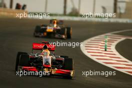 01.11.2009 Abu Dhabi, United Arab Emirates,  Lewis Hamilton (GBR), McLaren Mercedes  and Sebastian Vettel (GER), Red Bull RacinSebastian Vettel (GER), Red Bull Racing  - Formula 1 World Championship, Rd 17, Abu Dhabi Grand Prix, Sunday Race