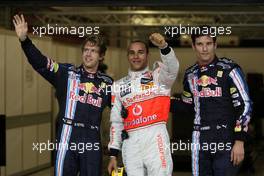 31.10.2009 Abu Dhabi, United Arab Emirates,  Sebastian Vettel (GER), Red Bull Racing, Lewis Hamilton (GBR), McLaren Mercedes in pole position and Mark Webber (AUS), Red Bull Racing - Formula 1 World Championship, Rd 17, Abu Dhabi Grand Prix, Saturday Qualifying