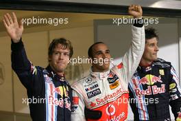 31.10.2009 Abu Dhabi, United Arab Emirates,  Sebastian Vettel (GER), Red Bull Racing; Lewis Hamilton (GBR), McLaren Mercedes and Mark Webber (AUS), Red Bull Racing  - Formula 1 World Championship, Rd 17, Abu Dhabi Grand Prix, Saturday Qualifying