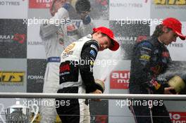 25.10.2009 Hockenheim, Germany,  Podium, champaign for Christopher Zanella (SUI), Motopark Academy, Portrait (3rd, center), Jean Karl Vernay (FRA), Signature (1st, left) and Mirko Bortolotti (ITA), Carlin Motorsport, Portrait (3rd, right) - F3 Euro Series 2009 at Hockenheimring, Hockenheim, Germany