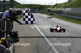 14.06.2009 Zandvoort, The Netherlands,  Race winner Valtteri Bottas (FIN), ART Grand Prix, Dallara F308 Mercedes taking the chequered flag - Masters of Formula 3, Circuit Park Zandvoort, The Netherlands