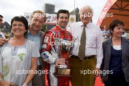 12.06.2009 Le Mans, France, Patrick Dempsey receives a trophy from the mayor of Le Mans - 24 Hour of Le Mans 2009, Driver Parade