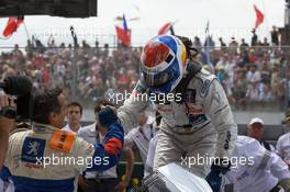 14.06.2009 Le Mans, France, Race winner Marc Gene celebrates with Serge Saulnier - 24 Hour of Le Mans 2009, Podium