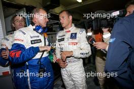 11.06.2009 Le Mans, France, Pole winner Stephane Sarrazin celebrates with Peugeot Sport director Olivier Quesnel - 24 Hour of Le Mans 2009, Qualifying