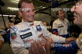 11.06.2009 Le Mans, France, Pole winner Stephane Sarrazin celebrates with Team Peugeot Total team members - 24 Hour of Le Mans 2009, Qualifying