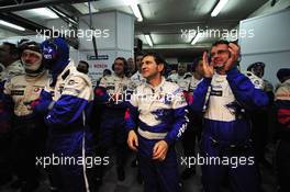 11.06.2009 Le Mans, France, Peugeot Sport team members celebrate Stephane Sarrazin's pole position  - 24 Hour of Le Mans 2009, Qualifying