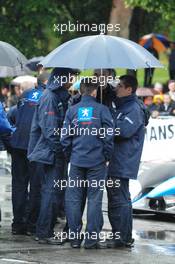 09.06.2009 Le Mans, France, Peugeot Sport team waits in the rain  - 24 Hour of Le Mans 2009, Tuesday