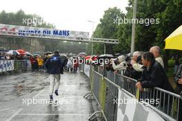 09.06.2009 Le Mans, France, Sebastien Bourdais runs during a rain shower  - 24 Hour of Le Mans 2009, Tuesday