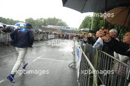 09.06.2009 Le Mans, France, Sebastien Bourdais runs during a rain shower  - 24 Hour of Le Mans 2009, Tuesday