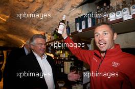 10.06.2009 Le Mans, France, Hand imprint ceremony: Tom Kristensen finds a Danish liquor at the reception - 24 Hour of Le Mans 2009, Wednesday