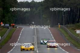 10.06.2009 Le Mans, France, #92 JMW Motorsport Ferrari F430 GT: Rob Bell, Andrew Kirkaldy, Tim Sugden, #76 IMSA Performance Matmut Porsche 911 GT3 RSR: Raymond Narac, Patrick Long, Patrick Pilet - 24 Hour of Le Mans 2009, Free Practice