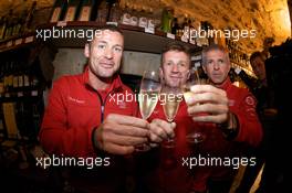 10.06.2009 Le Mans, France, Hand imprint ceremony: 2008 winners Tom Kristensen, Allan McNish and Rinaldo Capello toast with champagne at the reception - 24 Hour of Le Mans 2009, Wednesday