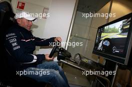 13-16.05.2010 Nurburgring, Germany,  Uwe Alzen plays with the race sims in the media center - Nurburgring 24 Hours 2010