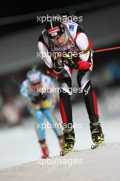 02.12.2010, Oestersund, Sweden (SWE): Dominik Landertinger (AUT), Fischer, Rottefella, Leki - IBU world cup biathlon, individual men, Oestersund (SWE). www.xpb.cc. © Manzoni/xpb.cc. Every downloaded picture is fee-liable.