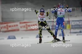 02.12.2010, Oestersund, Sweden (SWE): Martin Fourcade (FRA), Rossignol, Rottefella, Odlo - IBU world cup biathlon, individual men, Oestersund (SWE). www.xpb.cc. © Manzoni/xpb.cc. Every downloaded picture is fee-liable.
