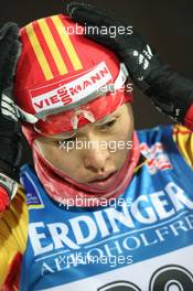 01.12.2010, Oestersund, Sweden (SWE): Chunli Wang (CHN), Fischer, Salomon, Swix, adidas  - IBU world cup biathlon, individual women, Oestersund (SWE). www.xpb.cc. © Manzoni/xpb.cc. Every downloaded picture is fee-liable.