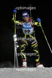 01.12.2010, Oestersund, Sweden (SWE): Marie Dorin (FRA), Rossignol, Rottefella, OneWay - IBU world cup biathlon, individual women, Oestersund (SWE). www.xpb.cc. © Manzoni/xpb.cc. Every downloaded picture is fee-liable.