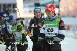 04.12.2010, Oestersund, Sweden (SWE): Simon Schempp (GER), Fischer, Rottefella, Alpina, Leki, adidas  with Andreas Birnbacher (GER), Fischer, Rottefella, Alpina, Leki, adidas - IBU world cup biathlon, sprint men, Oestersund (SWE). www.xpb.cc. © Manzoni/xpb.cc. Every downloaded picture is fee-liable.